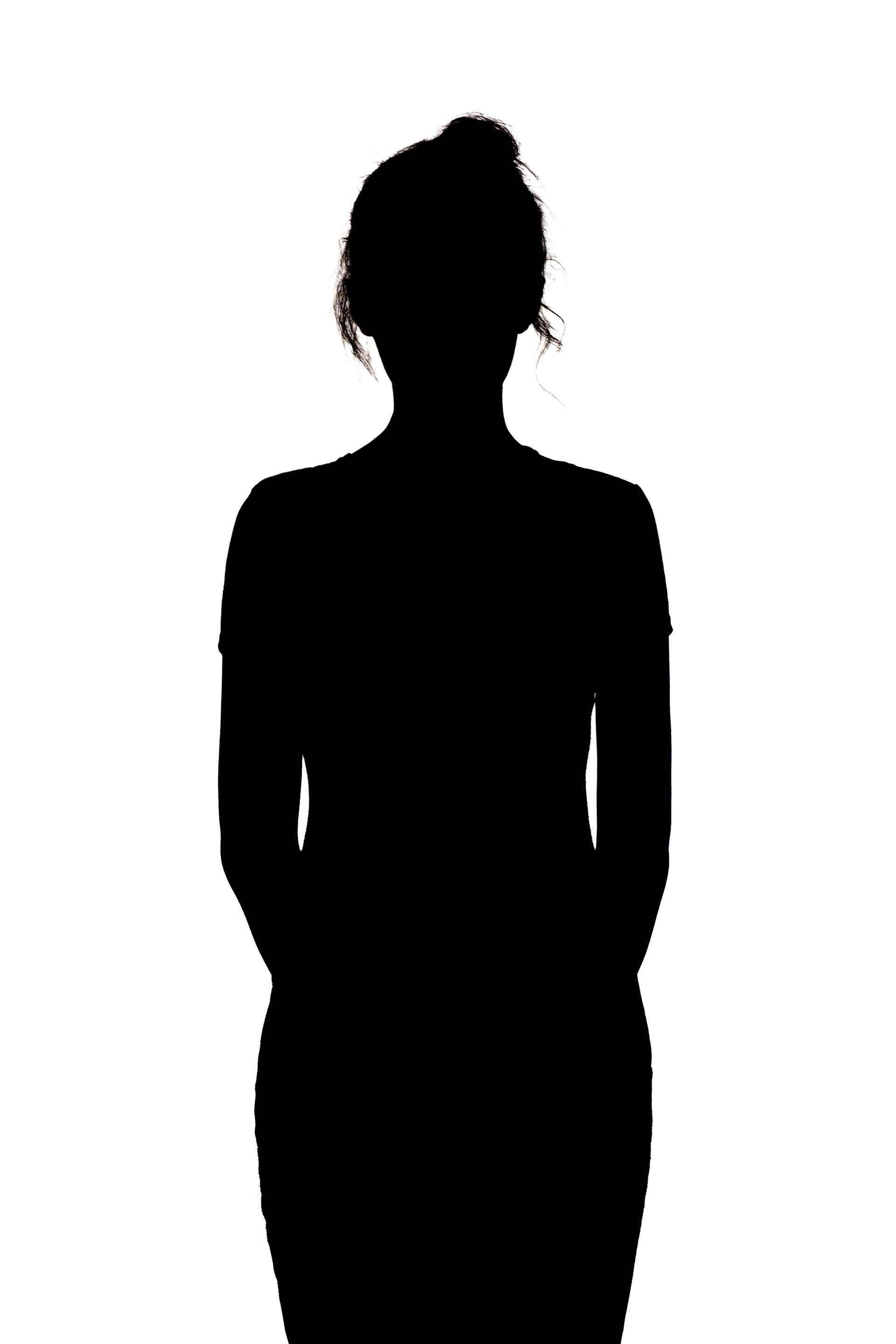 silhouette of a serious and confident young woman looking straight, beautiful girl on a white isolated background, concept beauty and fashion